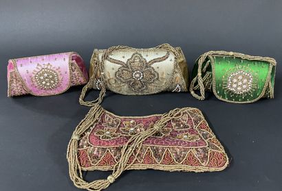Four pouches embroidered with Indian silk.
Minor...