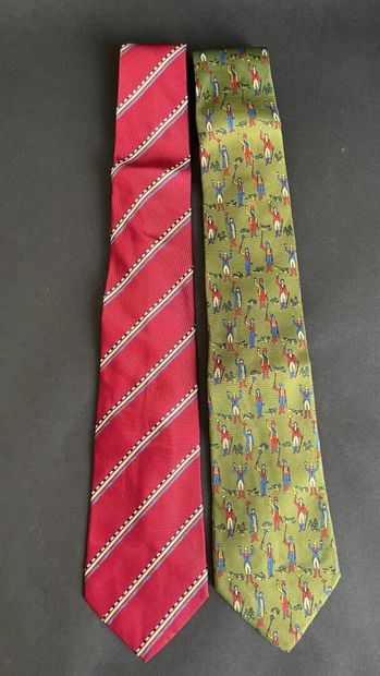 CHANEL
Striped evening tie with a burgundy...
