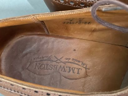 JM WESTON
Pair of brown leather lace-up derbies...