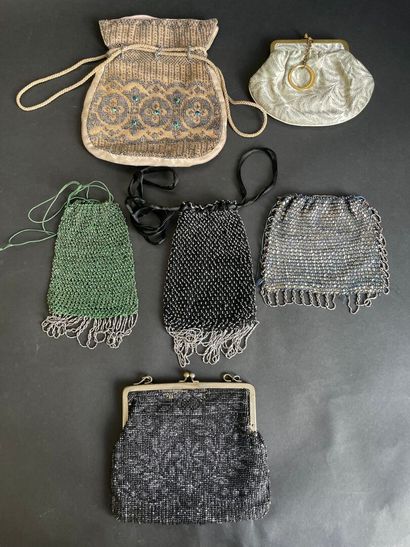 Set of six purses and pouches decorated with...
