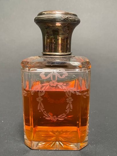 Set of four glass bottles with silver mounts...