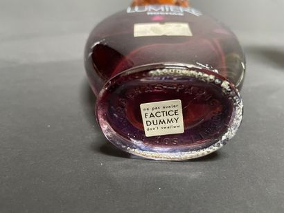 ROCHAS
Set including mock-up bottles and...
