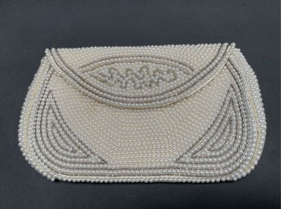 ANONYMOUS
Set of three beaded pouches, one...