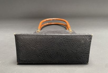 KENZO
21-cm bag made of reptile-embossed...