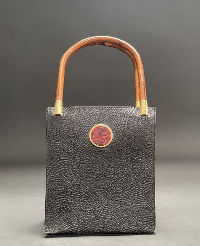 KENZO
21-cm bag made of reptile-embossed...