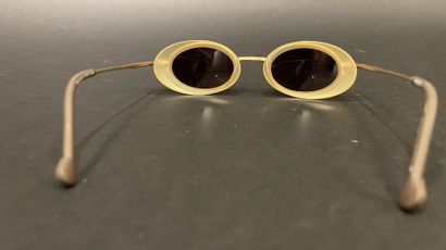 KENZO 
Two pairs of sunglasses: one is the...