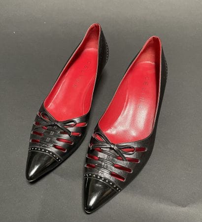 CELINE
Pair of black leather pumps with a...