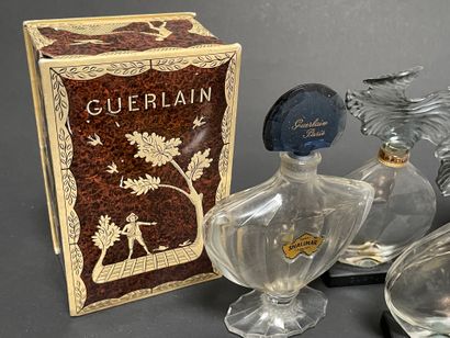 GUERLAIN
Set of spray bottles and empty ...