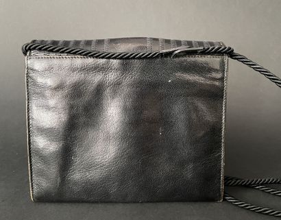 FENDI 
Small flat leather bag with black...