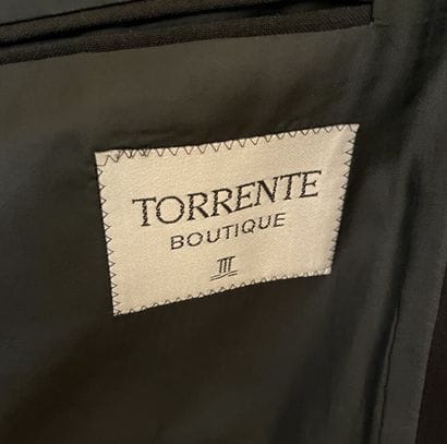 TORRENTE
Black wool tuxedo jacket with a...