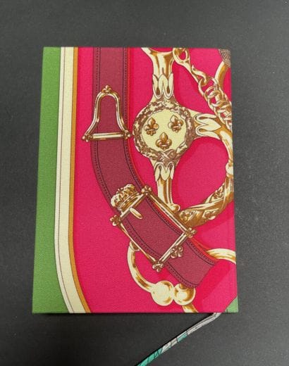 HERMES Paris
Printed silk notebook
In very...