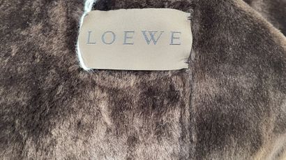 LOEWE
Brown shearling coat with a shawl collar...