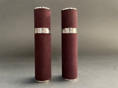 GUERLAIN
Two fabric-covered metal perfume...