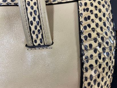 Sonia RYKIEL
Beige and black leather bag...