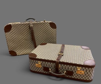 GOYARD
Set of 2 suitcases made of brown leather...