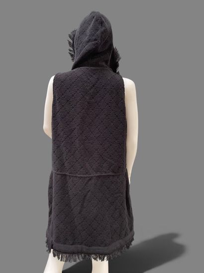 CHANEL
Black terry cloth dress with a hood,...