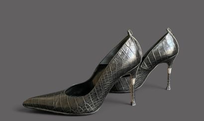 VERSACE 
Pair of black leather pumps with...