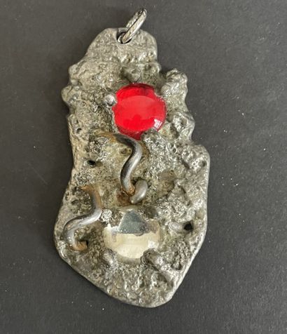 Four metal pendants, 
including “St. Francis...