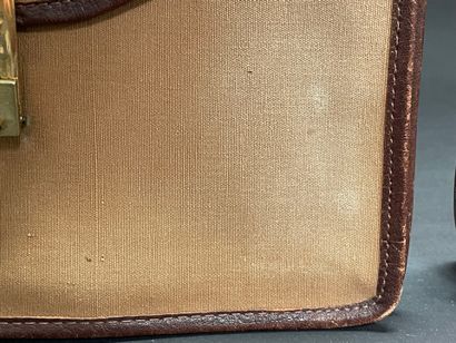CELINE 
Set of three 25-cm canvas and leather...