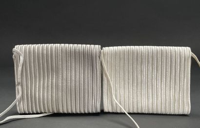 A REVIVED TRADITION
Two small trimmings bags,...