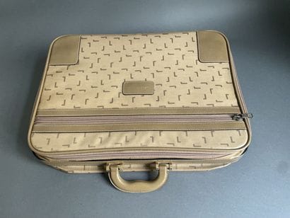 LANCEL
Two suitcases in coated canvas and...