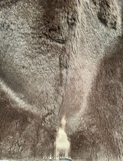 Yves SAINT LAURENT FUR
Brown leather coat...