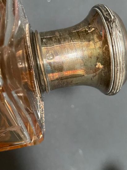 Set of four glass bottles with silver mounts...