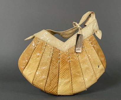 Stéphane KELIAN 
Patent python bag, handle,...