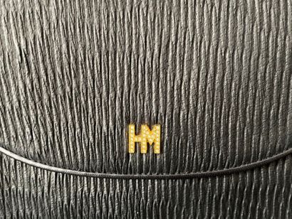 Hanaé MORI
25-cm clutch in black embossed...
