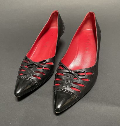 CELINE
Pair of black leather pumps with a...