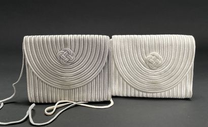 A REVIVED TRADITION
Two small trimmings bags,...