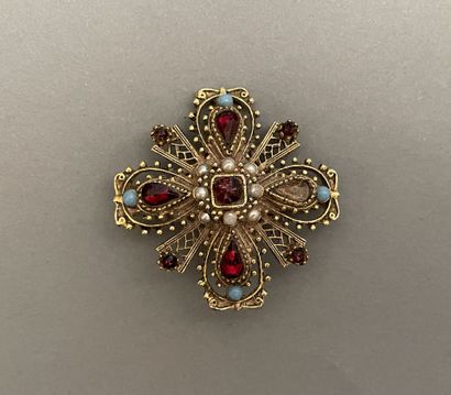 Brooch with beaded decoration set with glass...