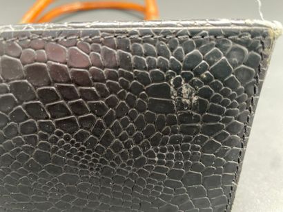 KENZO
21-cm bag made of reptile-embossed...