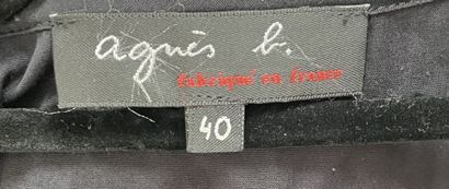 AGNES B. 
Long, sleeveless black cotton dress...