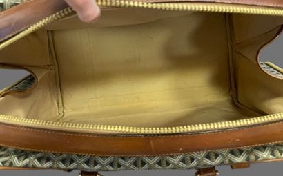GOYARD attributed to
Set in camel leather...