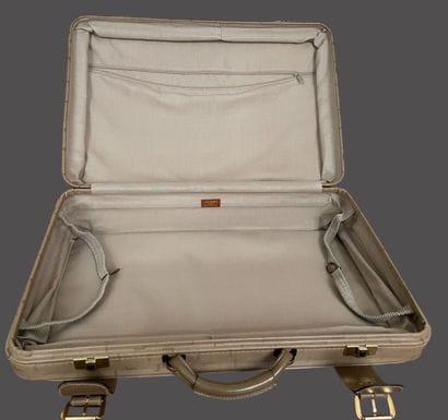 LANCEL
Two suitcases in coated canvas and...