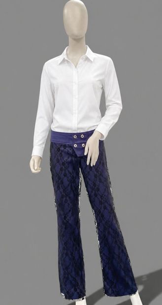 MELO E GRANO 
Burgundy pants accented with...