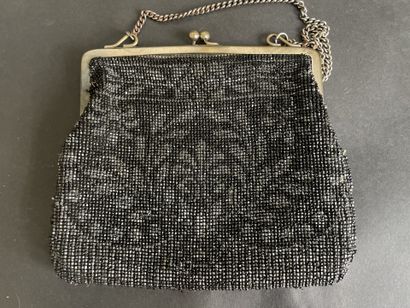 Set of six purses and pouches decorated with...