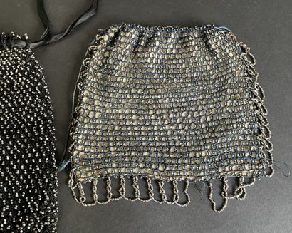 Set of six purses and pouches decorated with...