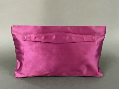 PRADA 
Burgundy satin clutch with a zipper...