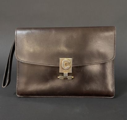 CELINE 
24-cm brown leather clutch, flap...