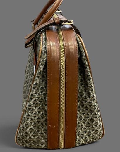 GOYARD attributed to
Set in camel leather...