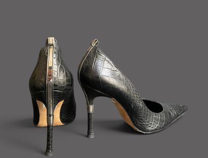 VERSACE 
Pair of black leather pumps with...