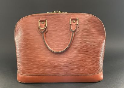 Louis VUITTON, circa 1996
Alma bag in camel-colored...