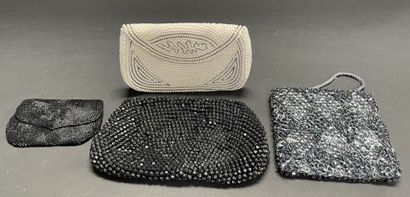 ANONYMOUS
Set of three beaded pouches, one...