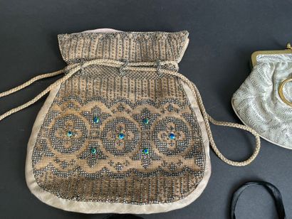 Set of six purses and pouches decorated with...