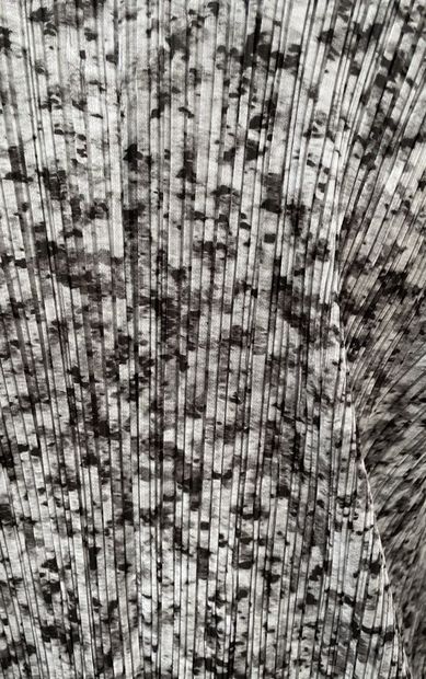 PLEATS PLEASE 
Short pleated dress in marbled...