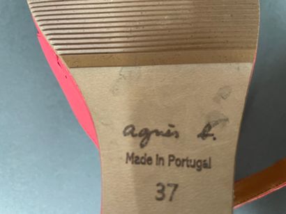 AGNES B 
Pair of coral-colored leather shoes...