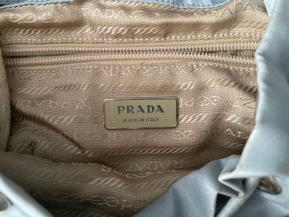 PRADA 
Small blue Re-nylon backpack, two...