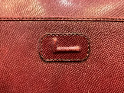 LANCEL 
Garnet leather shoulder bag, zipper...